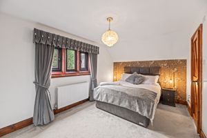 Bedroom One- click for photo gallery